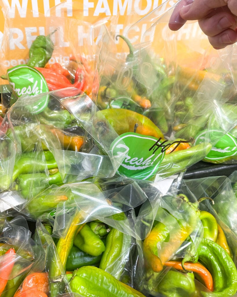 Shopping for Hatch chiles with different shapes and colors.