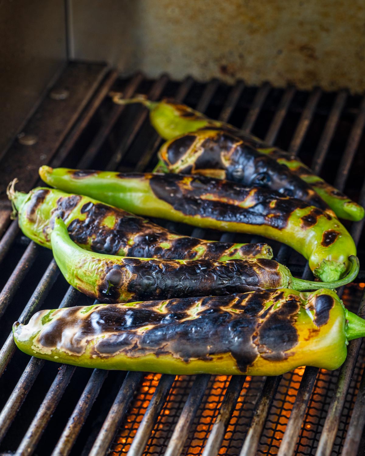 Roasting Hatch chiles is simple, just char them on the grill.
