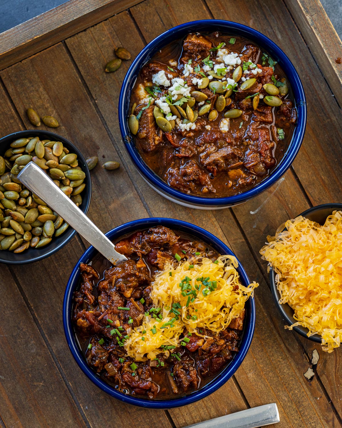Leftover brisket chili with different options for topping combinations.