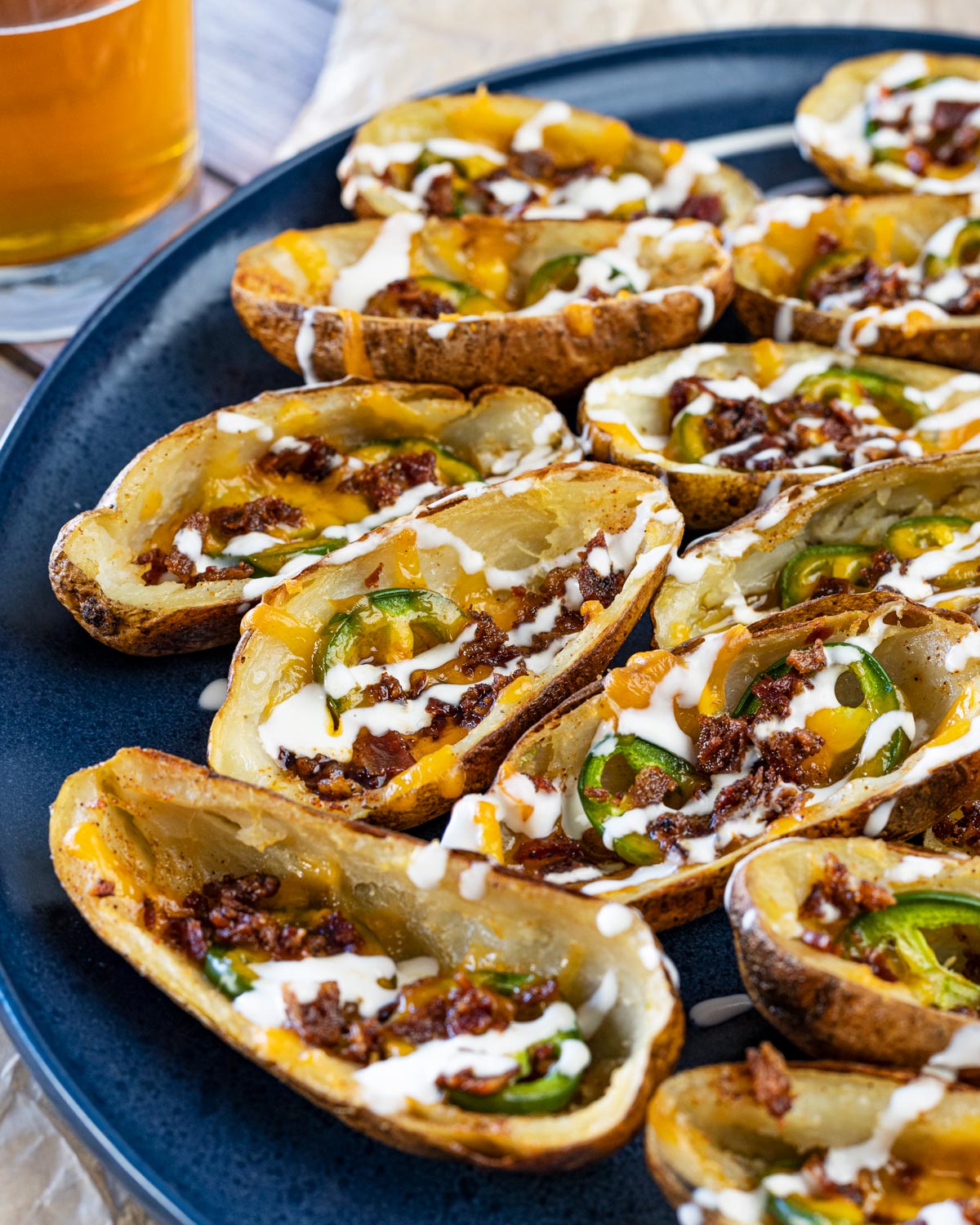Smoked potato skins are topped with fresh crema for an additional hit of flavor.