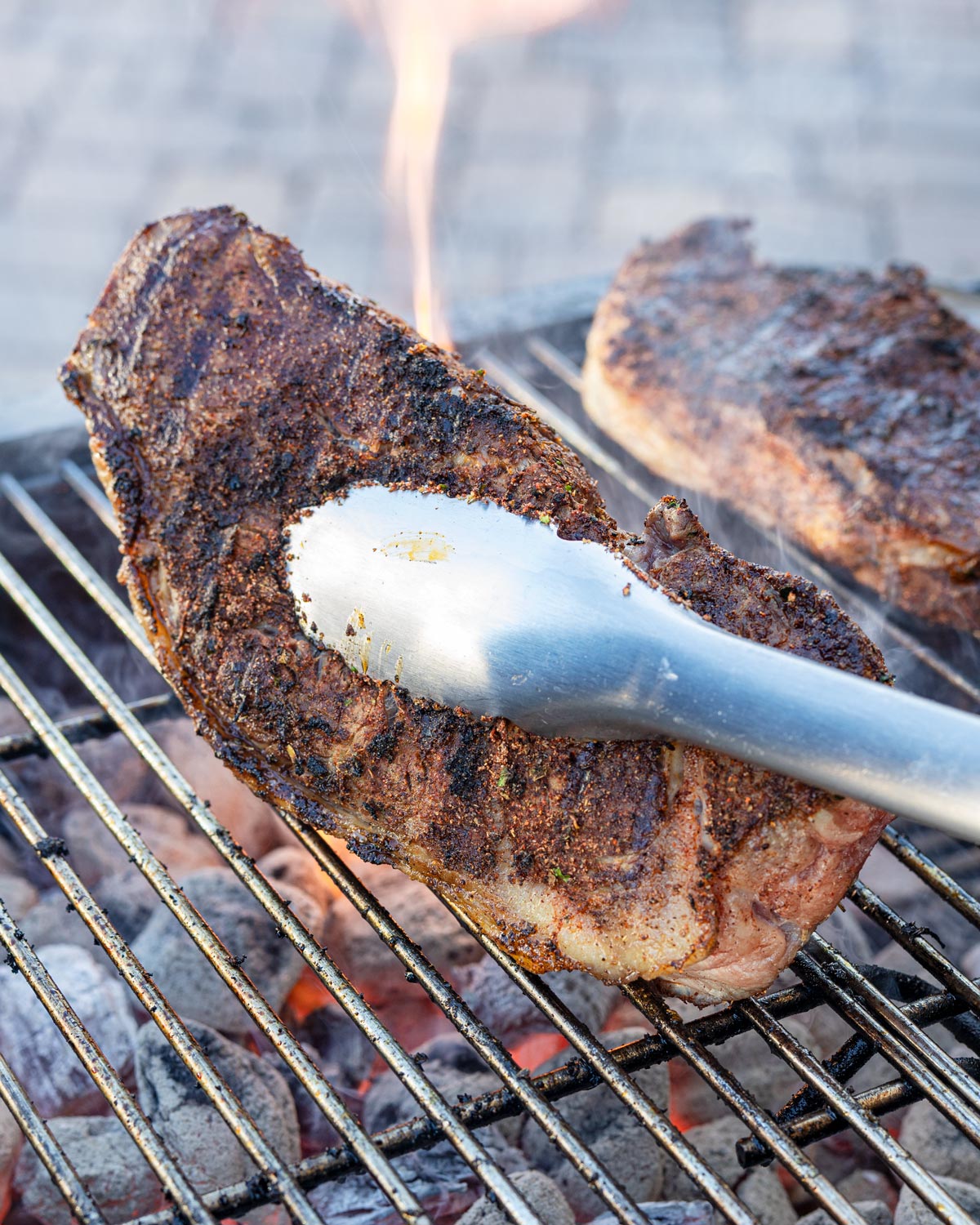 Sear the fat cap on the Cajun steak before taking it off the grill.