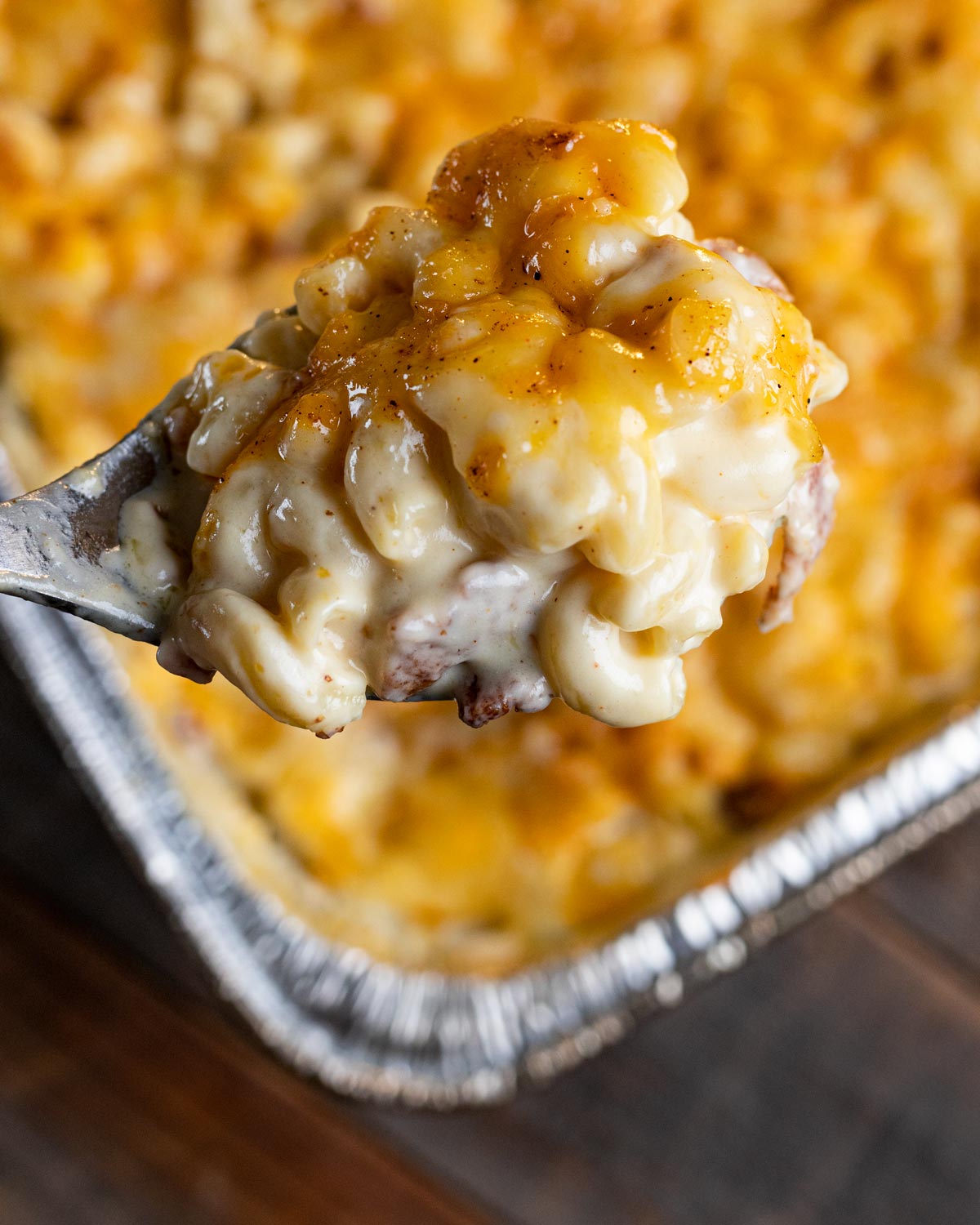 This smoked mac and cheese recipe stays creamy out of the smoker.
