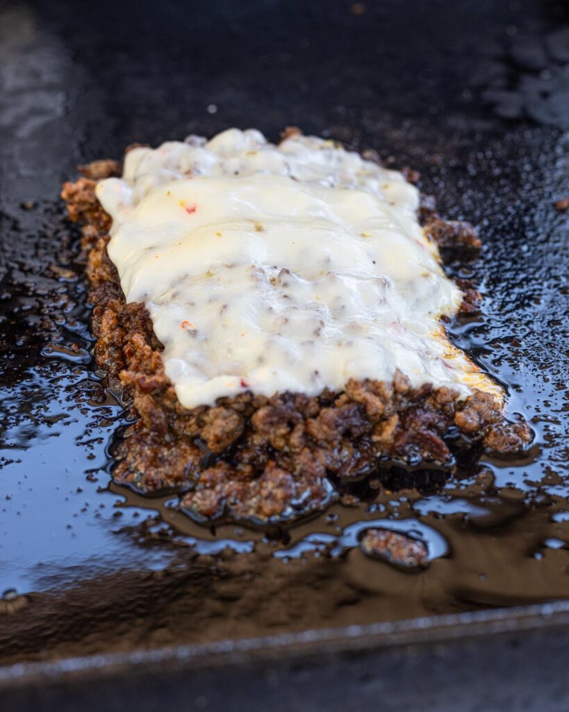 Melt the pepper jack cheese on top of the chipotle beef.