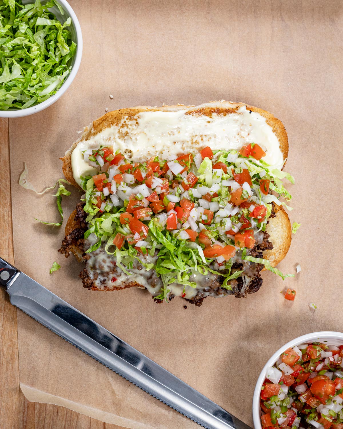Fill up the Mexican chopped cheese sandwich with your favorite toppings.