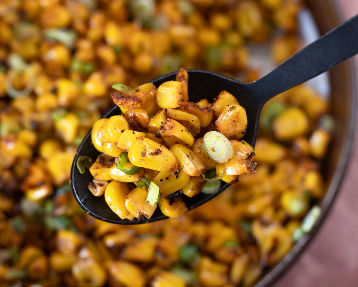 The charred corn has Cajun spices, butter, and green onions.