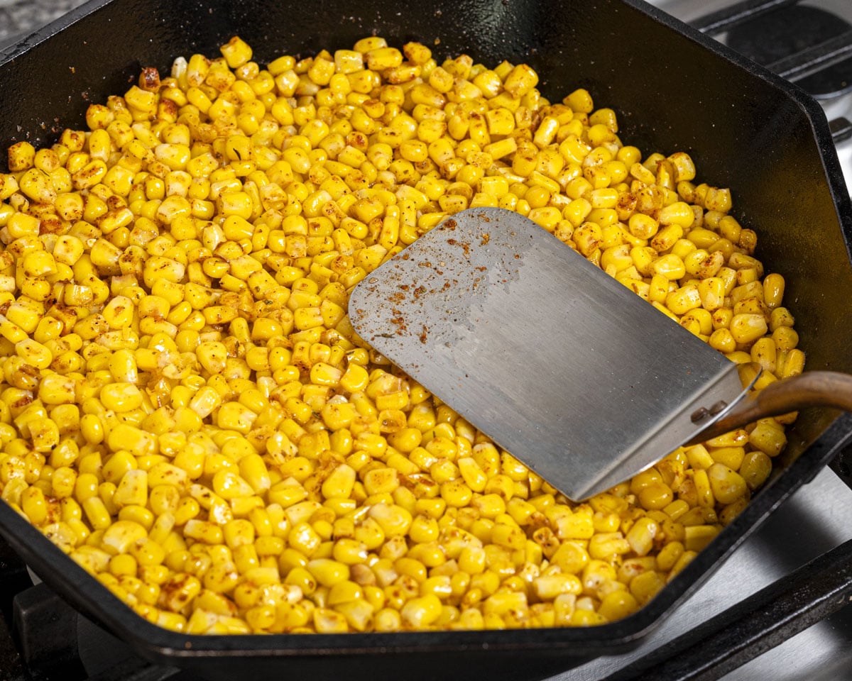 Press the corn down with a spatula to create a nice sear.