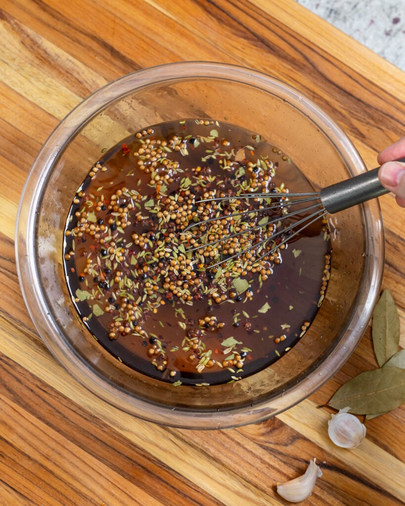 Whisk to dissolve the salts and sugar for the brine.