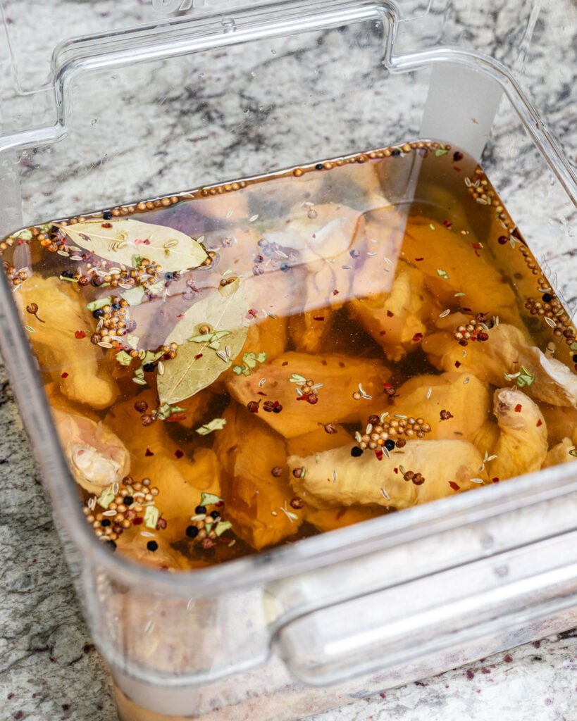 Don't let the chicken wings float to the top of the pastrami brine.
