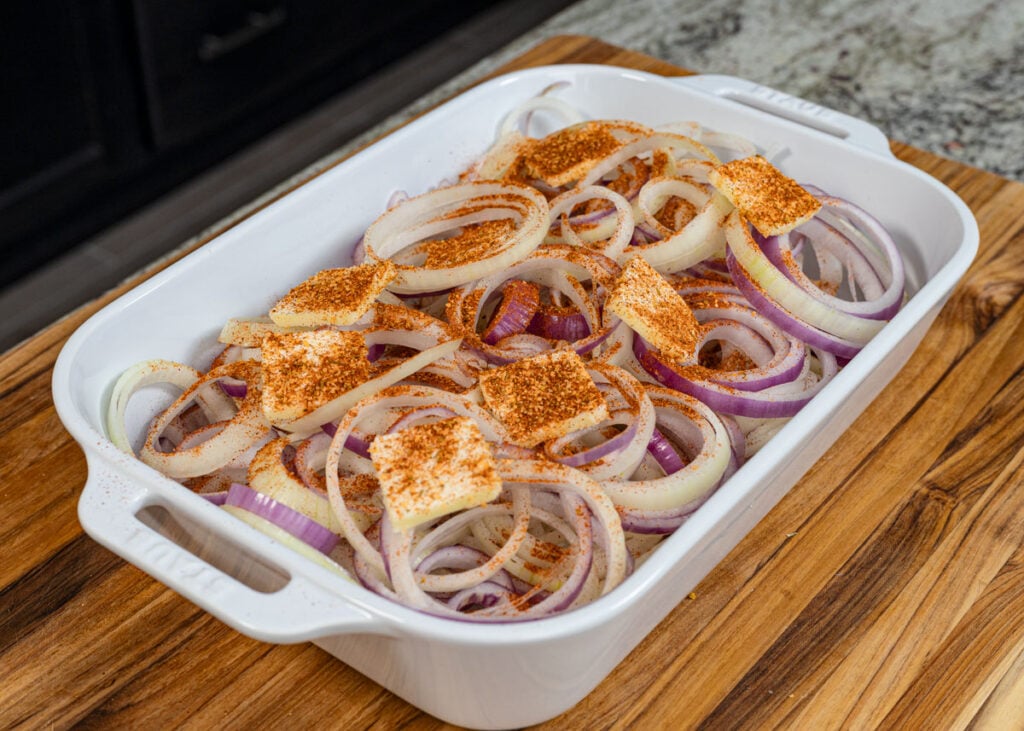 Sprinkle the Sedona Sand seasoning over the top of the onions and butter.