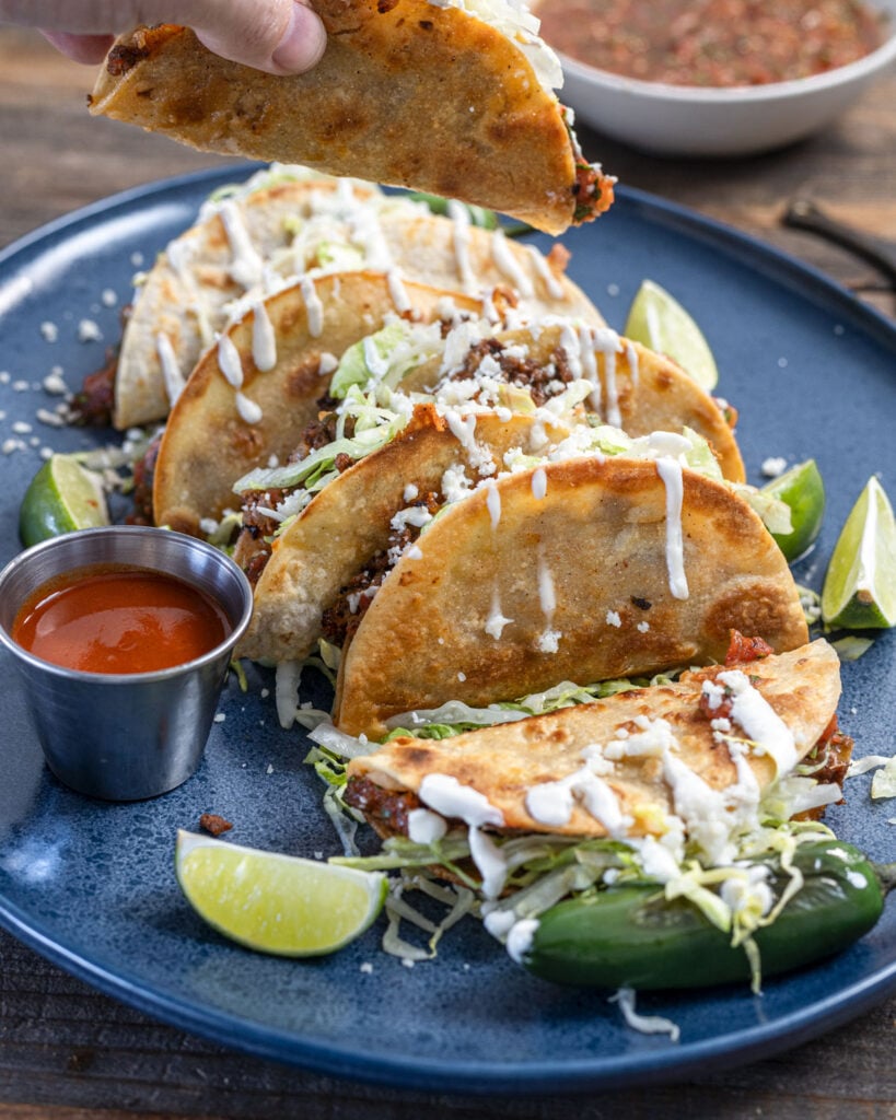 Grab a hold of these crispy ground beef tacos.