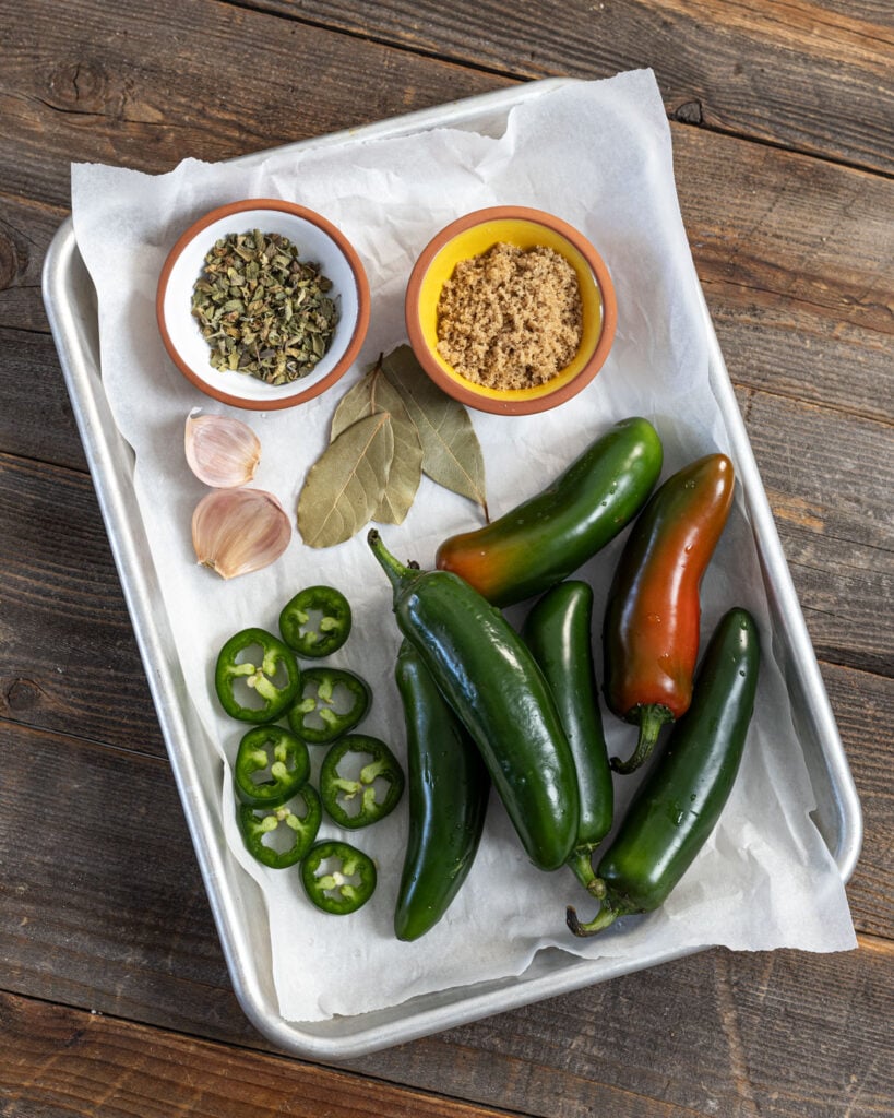 Jalapenos, sugar, and spices are the ingredients for this quick pickled jalapeno recipe.