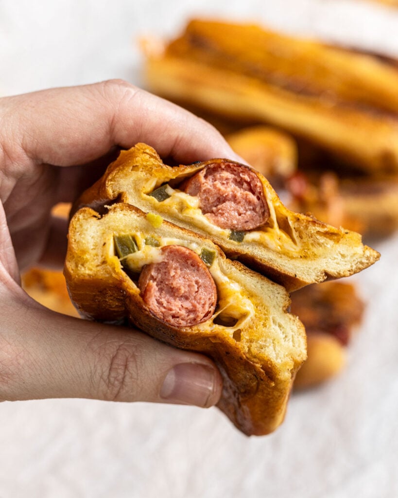 Take a peek inside the layers of the grilled cheese dog.