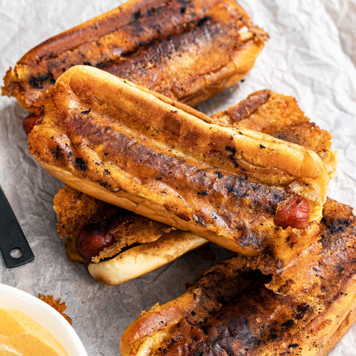 Featuring grilled cheese hot dogs, a fusion of foods.