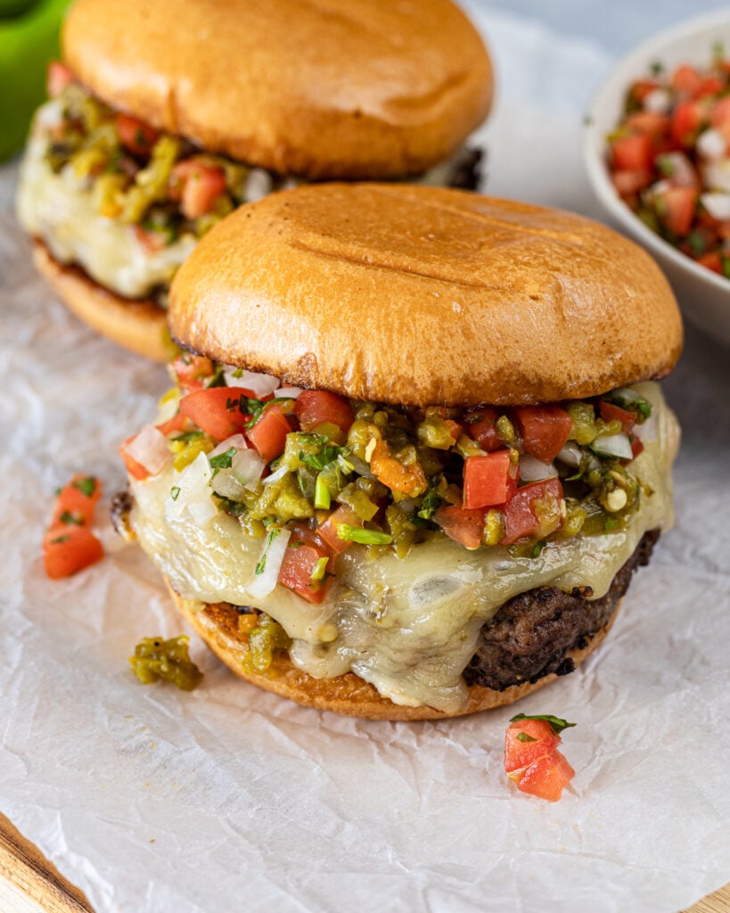 Cheesy Hatch chile queso burger with pico de gallo