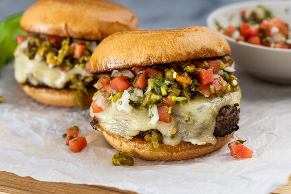 Green chile queso burger with fresh salsa and plenty of cheese