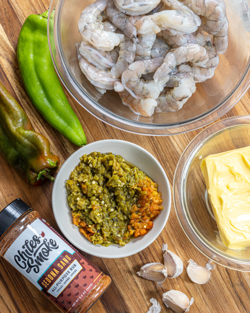 Ingredients include Hatch chiles, shrimp, garlic, butter, and spices.