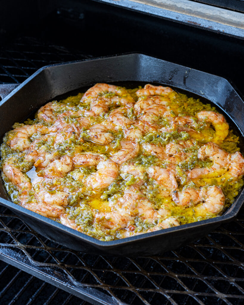 Smoke the skillet of chile butter shrimp for about 30 minutes, or until temp.
