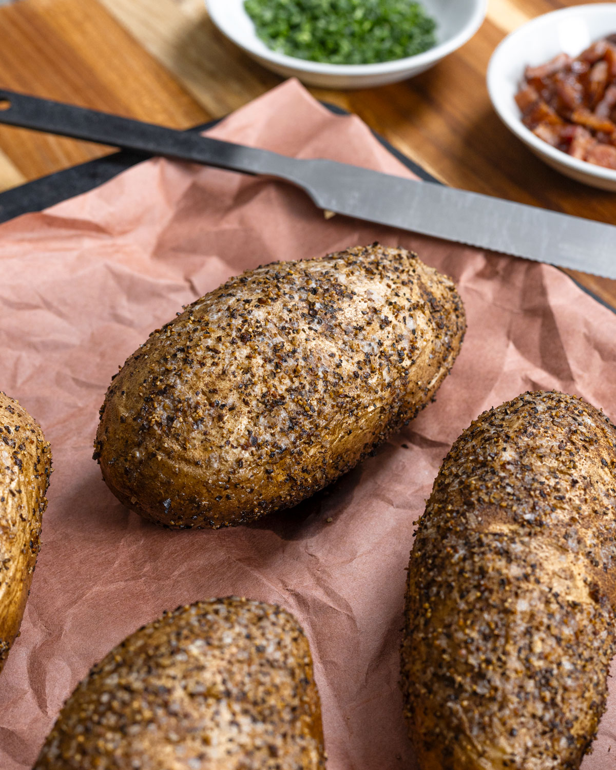 Smoked potatoes are seasoned and ready to be sliced