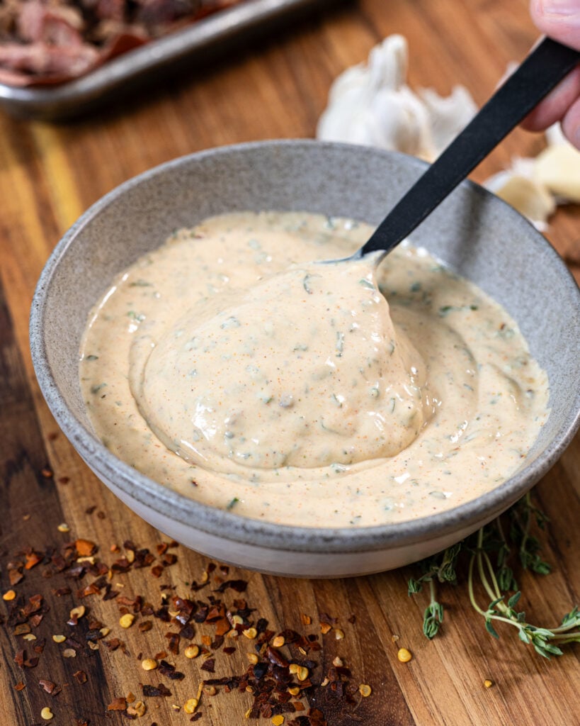 Cowboy sauce in a bowl with herbs and spices