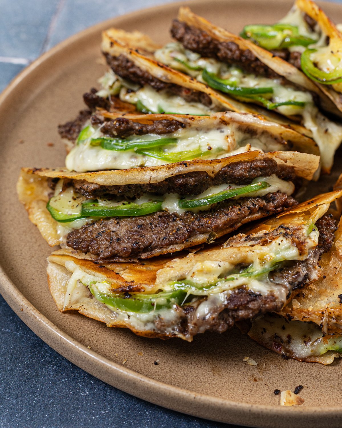 Plate of fried smash burger tacos.